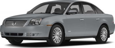 Silver sedan showing front side view with grille and alloy wheels
