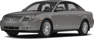Silver sedans front side view with headlight and wheel details