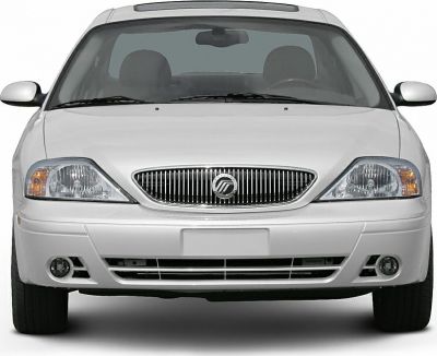Front view with signature grille and headlights of a sedan