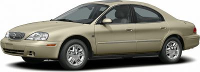 Side view of 2004 sedan with chrome grille and alloy wheels