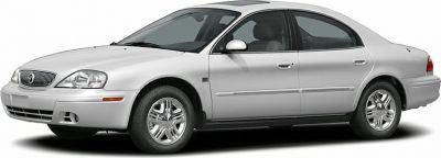 Silver sedan with sleek body, chrome wheels, and smooth lines