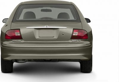 Rear view with taillights, trunk, and rear badges