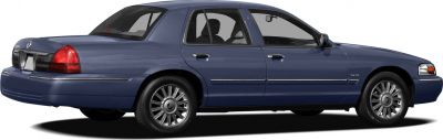 Classic four-door sedan side profile with alloy wheels and blue paint