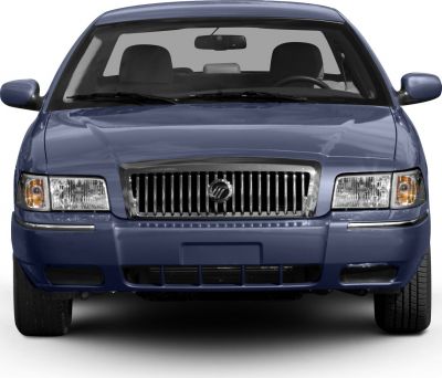 Front view with chrome grille and rectangular headlights