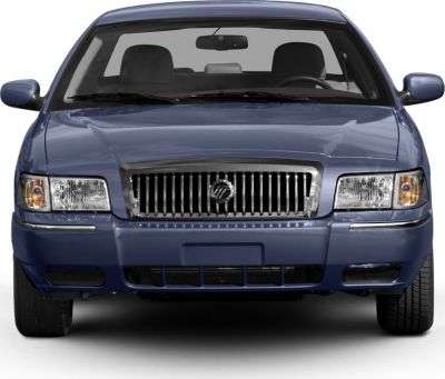 Front view with vertical grille bars and rectangular headlights