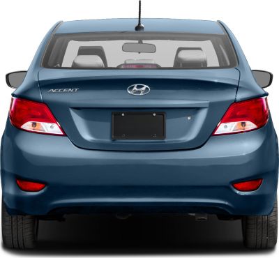 Rear view showing tail lights, trunk, rear window, and bumper.