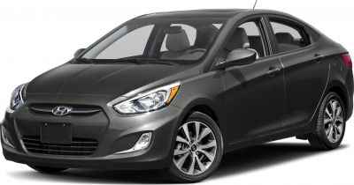 Front side view showing sleek headlights and alloy wheels