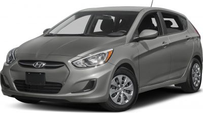 Silver hatchback with front grille and alloy wheels