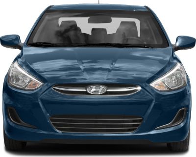 Front view with grille and headlights of compact car