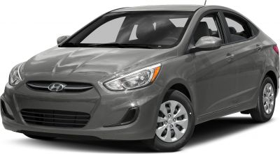 Front side view of a compact sedan with detailed headlights and wheels.