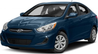 Front side view with distinctive headlights and streamlined sedan body