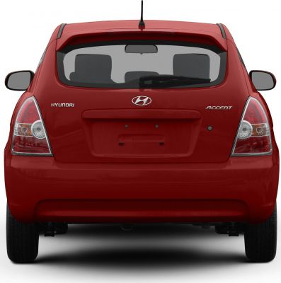Rear view of compact hatchback with distinct tail lights and rear window