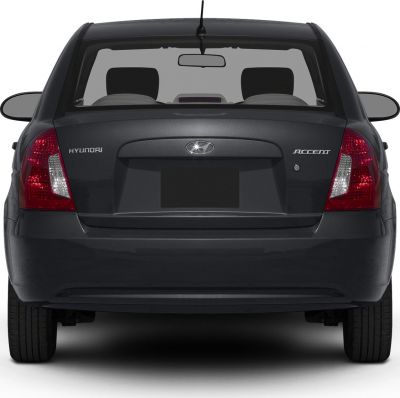Rear view of compact hatchback with distinct taillights and rear window