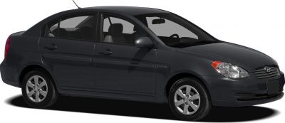 Side profile view of a four-door compact sedan with alloy wheels