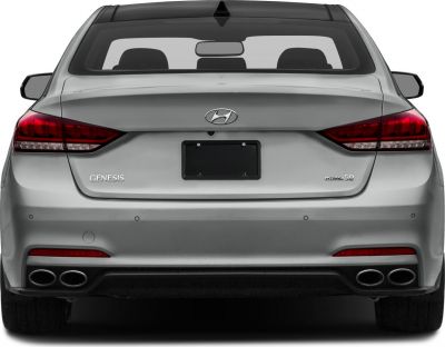 Rear view with quad exhaust and sleek taillights