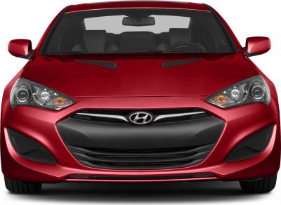 Front view of car with grille, headlights, and hood vents