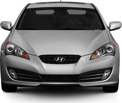 Front view with sporty headlights and sleek grille.
