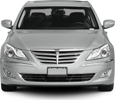 Front view with distinctive grille, headlights, fog lamps, and side mirrors