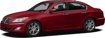 Front-side view of a red sedan with chrome grille and alloy wheels