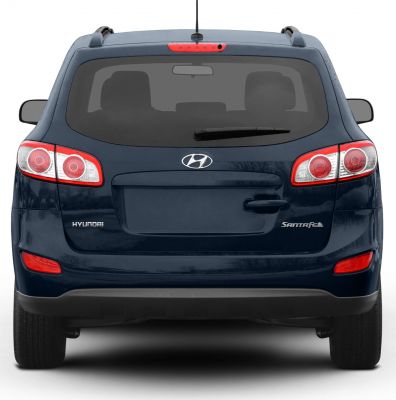 Rear view with distinctive tail lights and rear window.