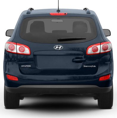 Rear view with taillights, rear windshield, wiper, and bumper.