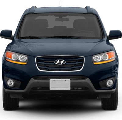 Front view with dual round headlights and distinctive grille