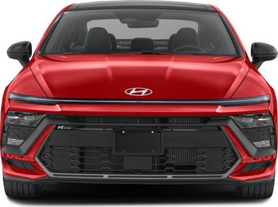 Front view of car with aggressive grille and LED headlights