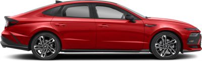 Side profile of sleek sedan with aerodynamic lines and sporty alloy wheels