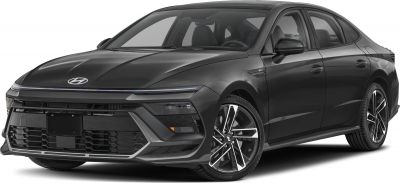 Modern sedan with aggressive front grille and LED headlights.