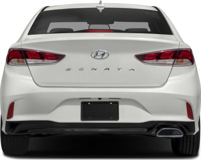 Rear view showing taillights and trunk with integrated rear bumper.