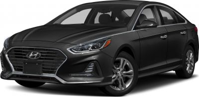Signature grille and sharp headlights on mid-size sedan front