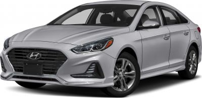 Front three-quarter view highlighting grille, headlights, and alloy wheels