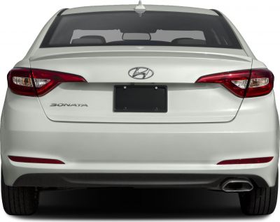 Rear view of a sedan with distinct taillights and trunk styling
