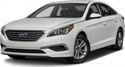 Close-up of front headlights and grille of a sedan