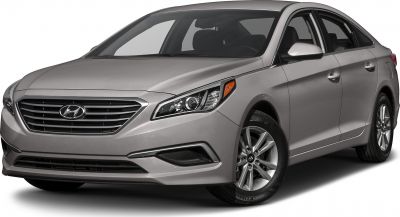 Front side view of a mid-size sedan with distinctive headlight and grille