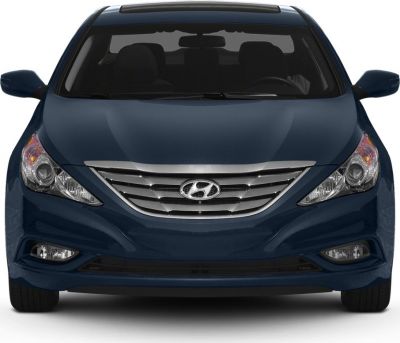 Front view with distinctive grille and headlights
