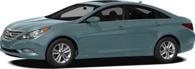 Streamlined side profile of a mid-size sedan with aerodynamic contours and alloy wheels.