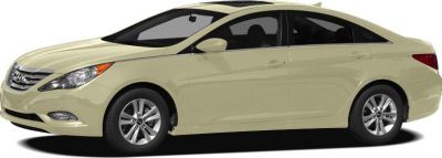 Side profile view with alloy wheels of a sleek four-door sedan