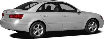 Silver midsize sedan side and rear view with alloy wheels and rear spoiler