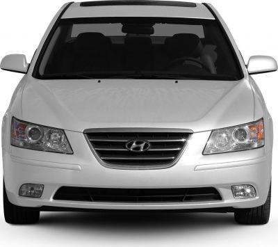 Front view with chrome grille and dual headlights