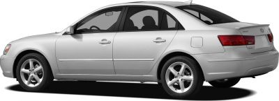 Silver four-door sedan side view with alloy wheels