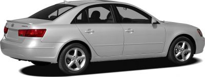 Silver midsize sedan side and rear view with alloy wheels