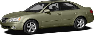 Side profile of a streamlined mid-size sedan with alloy wheels
