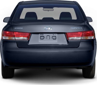 Rear view with trunk and taillights of a 2005 mid-2000s sedan
