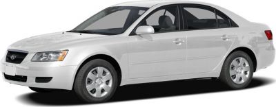 White mid-size sedan with alloy wheels and sleek side profile