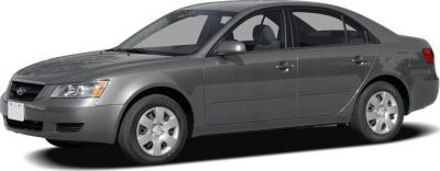 Side-front view of a four-door sedan with alloy wheels and modern design