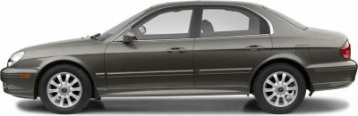Side profile of a 2001 midsize sedan with alloy wheels and smooth body lines