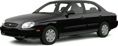 Black sedan with rounded headlights and smooth body design