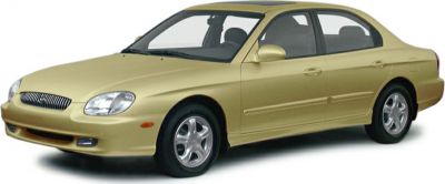 Rounded mid-size sedan side view with alloy wheels and smooth contours