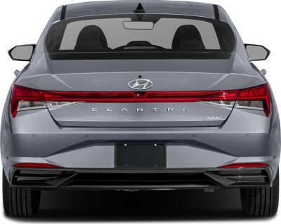 Rear view with full-width taillight and modern rear design